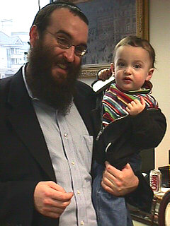 Baby Mendel and Our Rabbi at Capetown's Atlanta Headquarters
